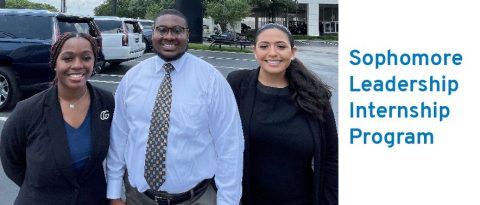 Three students stand side-by-side while smiling with text reading "Sophomore Leadership Internship Program"