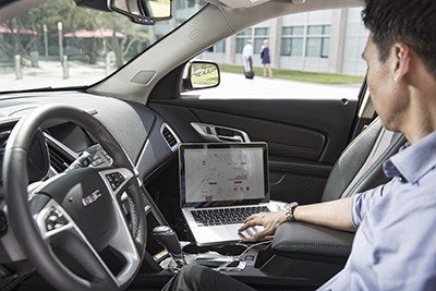 Contractor working from his vehicle interior